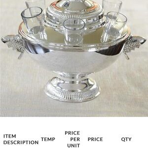 Beautiful silver caviar and vodka serving piece.